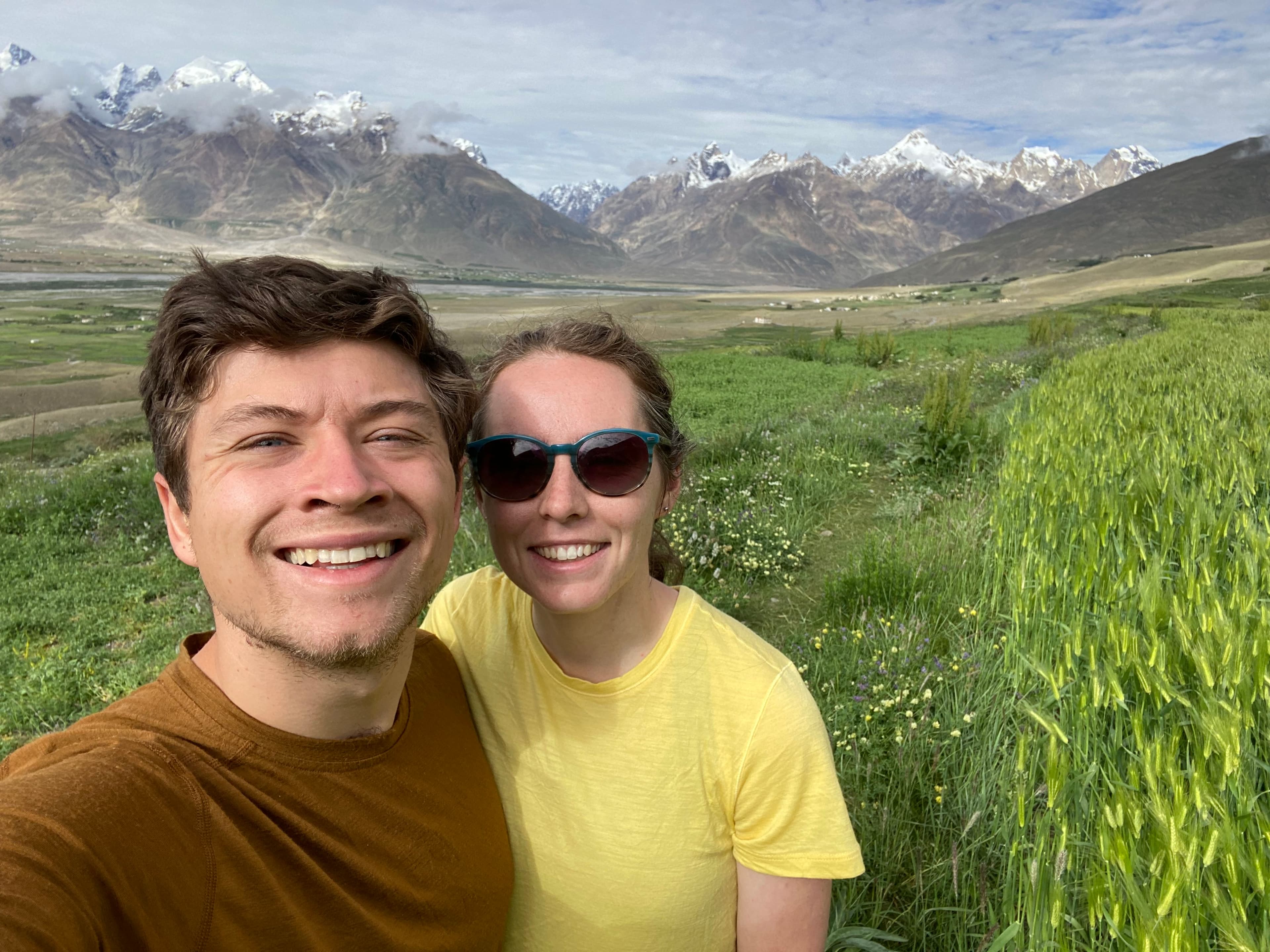 Micah and his wife backpacking in the mountains