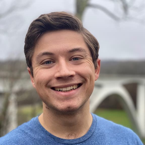 Micah Hauge smiling outdoors